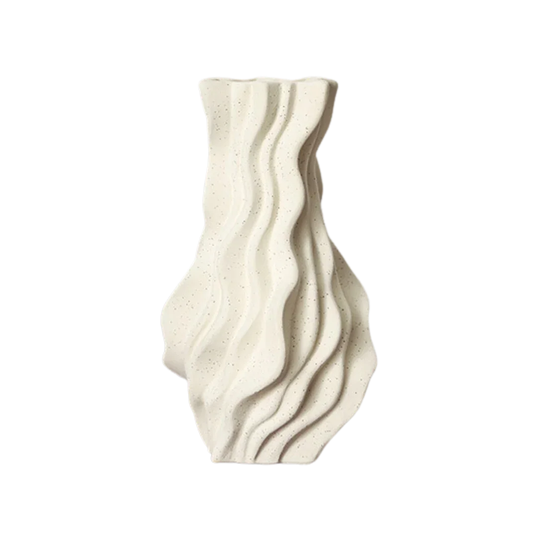 Textured ceramic vase with wavy, sculpted design and matte cream finish