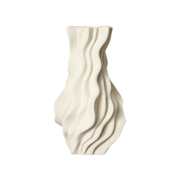 Textured ceramic vase with wavy, sculpted design and matte cream finish