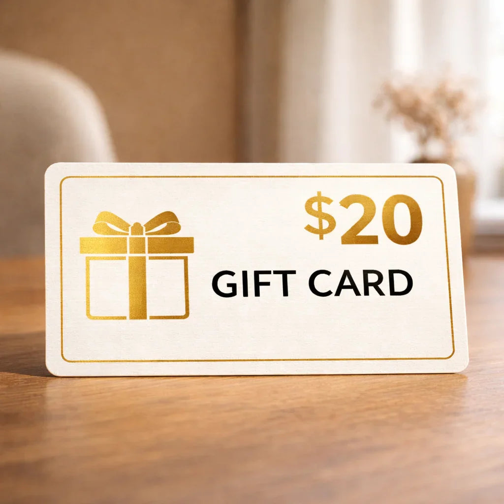 $20 gift card with gold present icon on wooden table, closeup