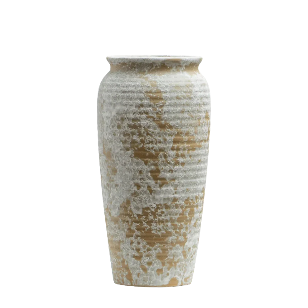 Tall ceramic vase with textured beige and white glaze on a black background