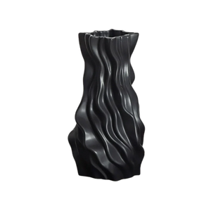 Modern black ceramic vase with wavy sculpted ridges, minimalist home decor