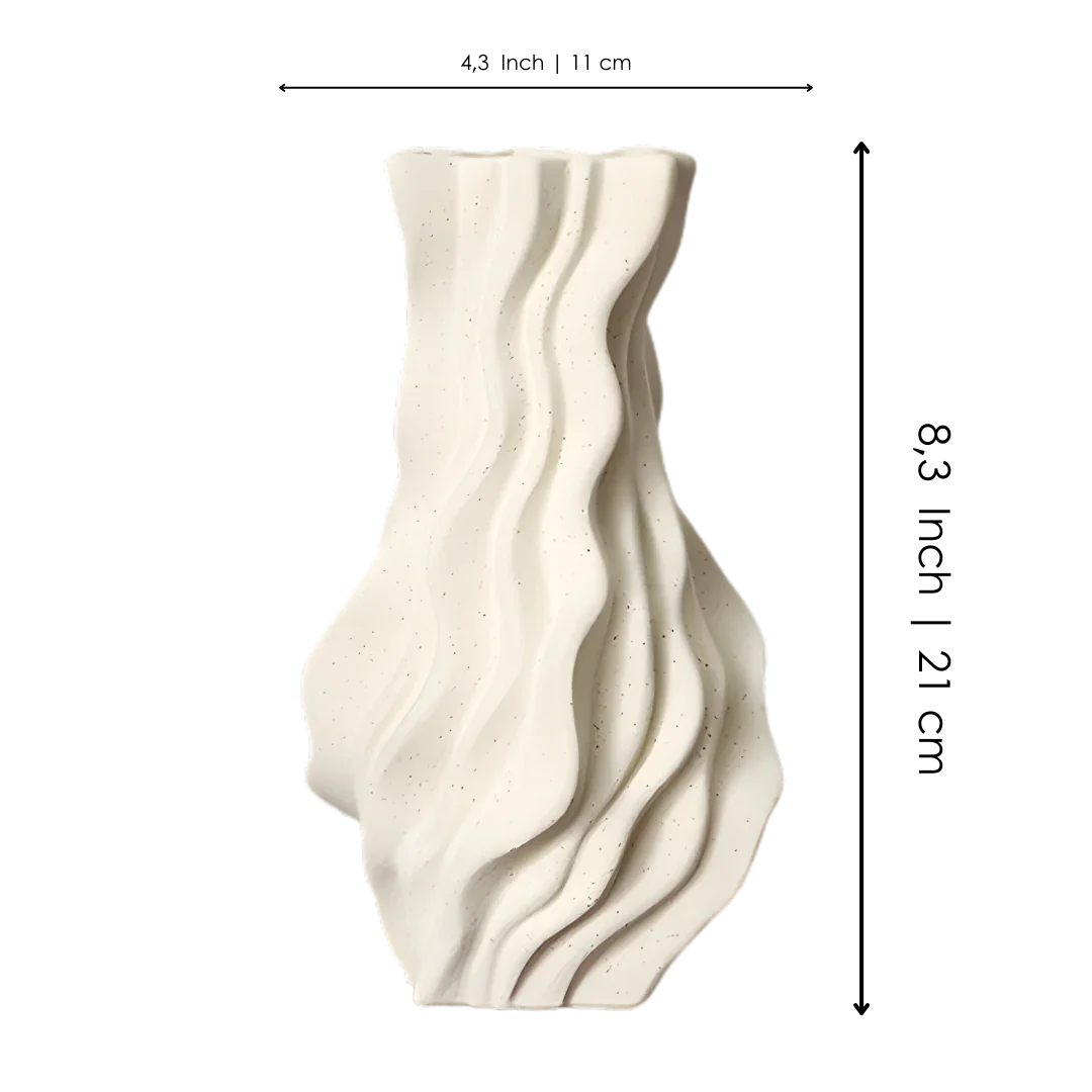 Modern ceramic vase with wavy textured surface in matte off-white finish