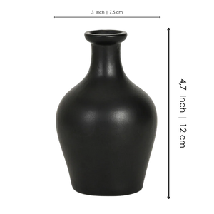 Matte black ceramic vase with wide body and narrow neck