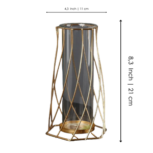 Modern glass vase with gold wire geometric frame on black background