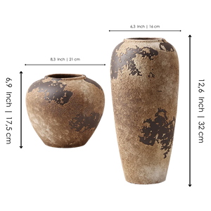 Set of two rustic brown ceramic vases with textured, weathered finish